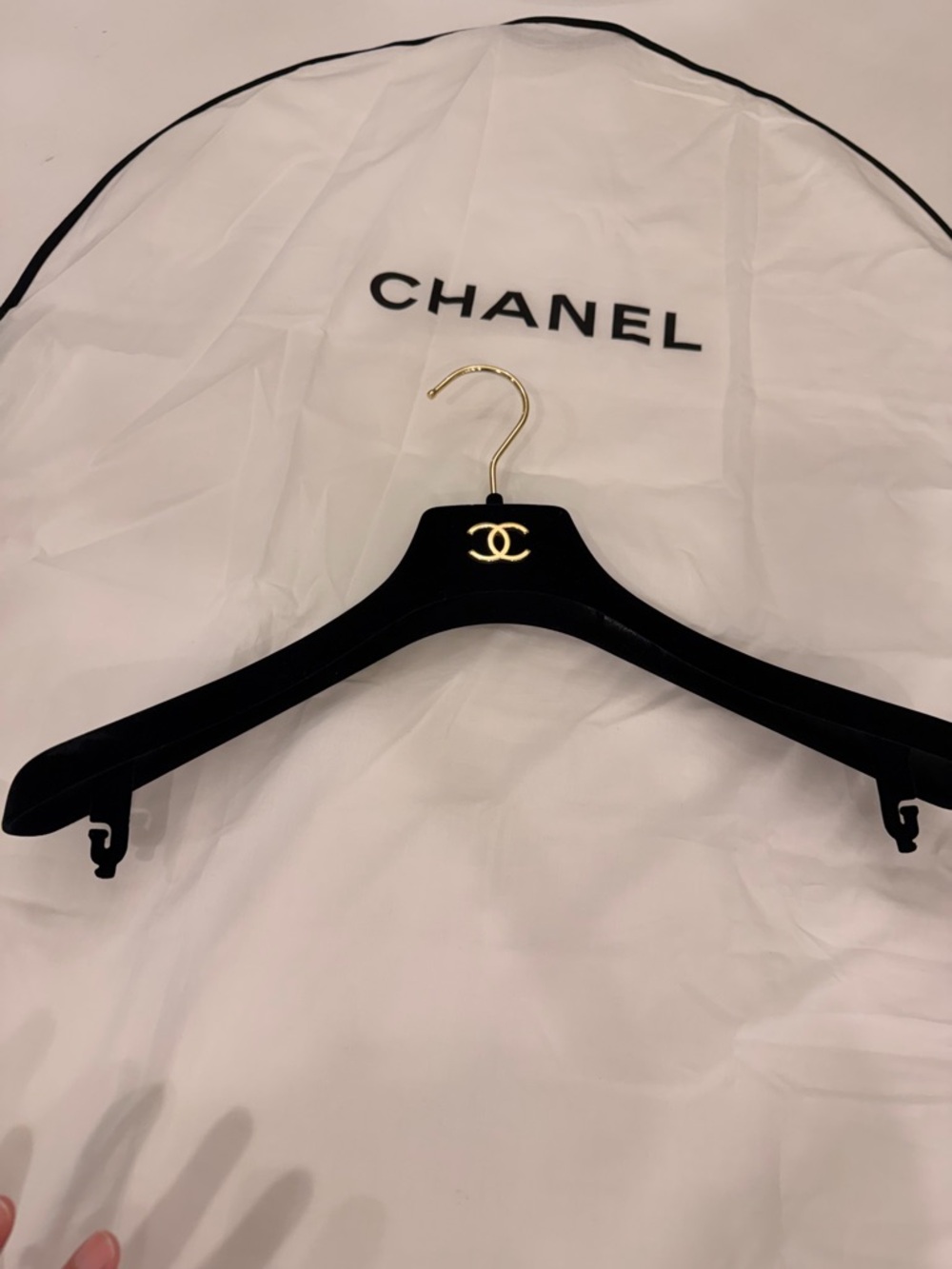 CHANEL white and black garment.. 70x88. Plus Chanel hanger .. two pieces
